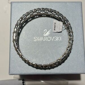 Swarovski limited addition silver 925 bangle with blue sapphires.